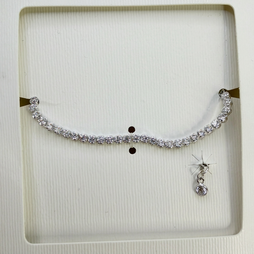 Silbernes Tennisarmband aus 925, Zirkonia-Besatz mit dunklen Akzenten und Anhänger