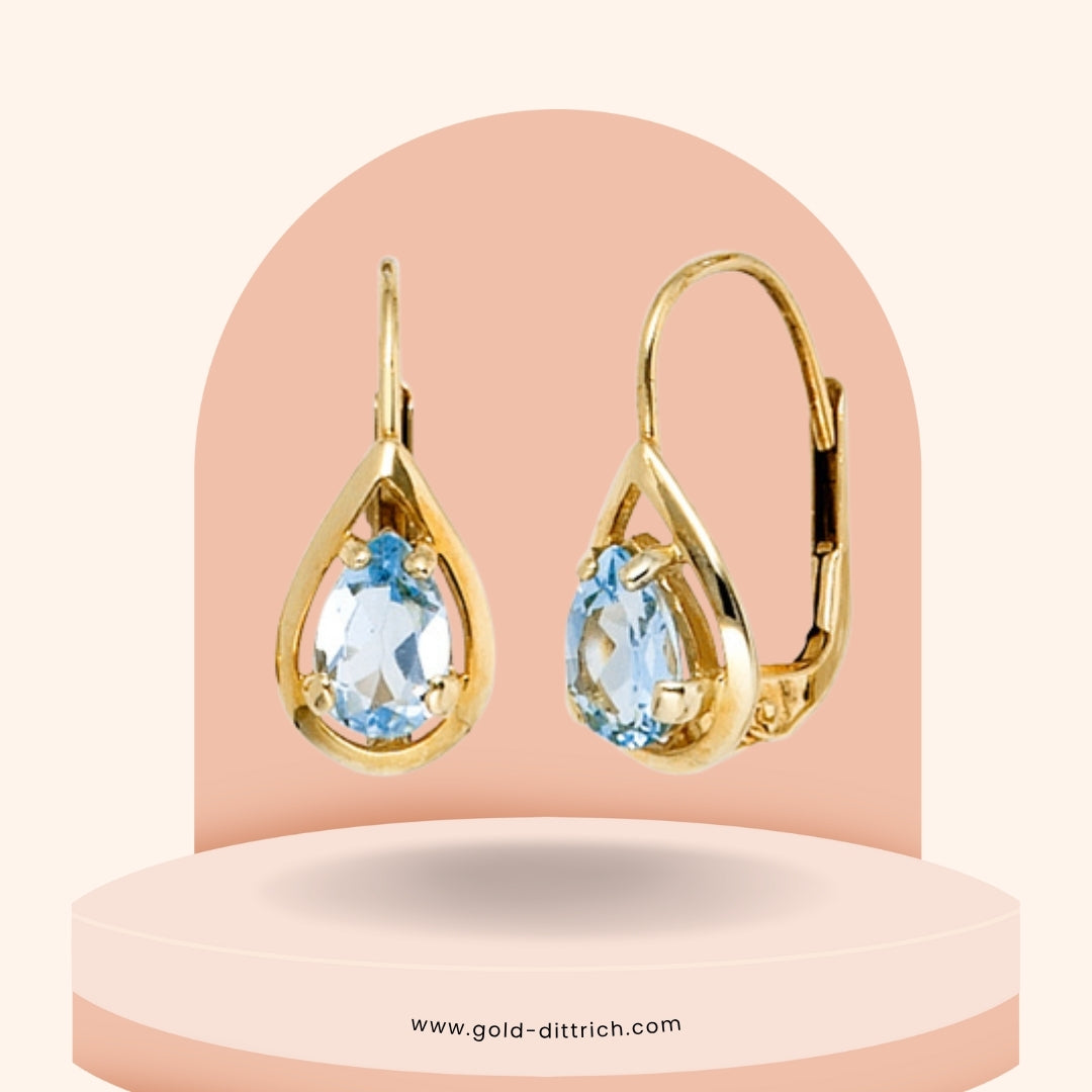 Ohrringe Boutons mit Blautopas - 333 Gold